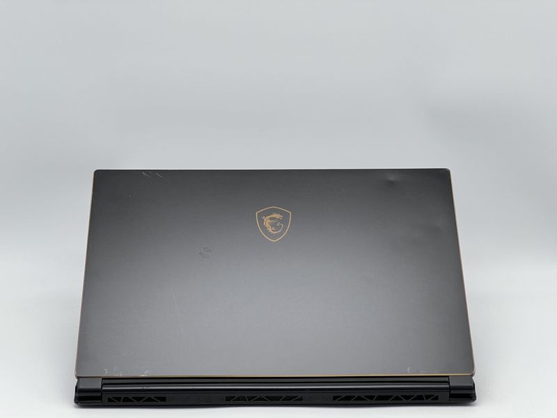 Ноутбук MSI GS65 Stealth Thin 8RE-033NE / 15 IPS 144Гц 1920x1080 / i7-8750H / RAM 16 GB / SSD 960 GB / NVIDIA GeForce GTX 1060 / Клас B / БУ MSGS65STLTHTHN8R033NI7106096016IB фото від Pixel